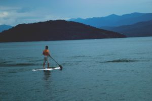 man paddling 