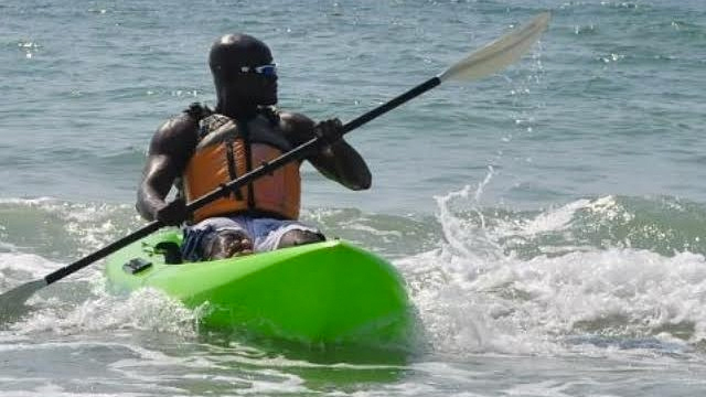 man kayaking